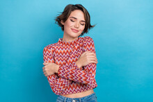 Photo Of Dreamy Sweet Lady Wear Pink Shirt Closed Eyes Embracing Herself Isolated Blue Color Background