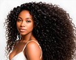 African american girl with long and shiny wavy hair on white background. Beautiful model with curly hairstyle. Generative AI.