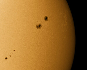 Wall Mural - closeup on the suns surface with sunspots on 30th of may 2023
