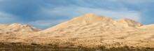 Panoramic Landscape Scenic View In Mojave Desert, California With Kelso Sand Dunes In View On Blue Sky Day.