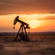 © StockSavant - Crude oil pumpjack rig on desert silhouette in evening sunset