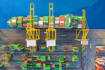 Wall Mural - Aerial view of business logistic import and export freight transportation by container ship in harbor, Container loading Cargo freight ship.