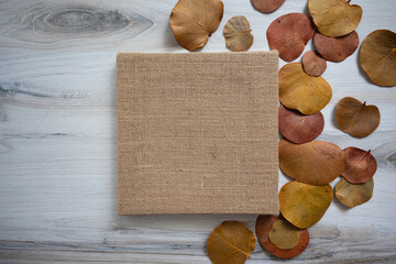 Blank brown burlap square canvas fall and autumn themed flat lay background