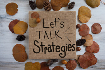 Let's talk strategies sign autumn themed photo 