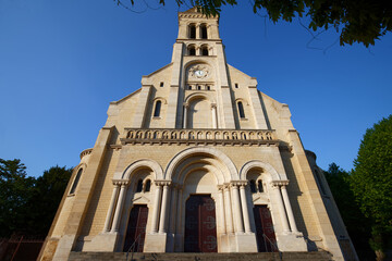 Wall Mural - Main facade of the Notre-Dame-du-Rosaire Church, in Saint-Ouen, France .