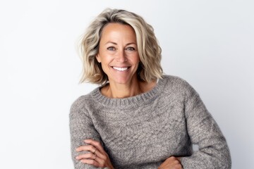 Group portrait photography of a pleased woman in her 40s that is wearing a cozy sweater against a white background . Generative AI