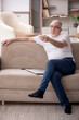 © Elnur - Old man sitting at home