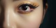 © Neda Asyasi - Beautiful asian woman eye with long eyelashes. Female eye with natural make-up. Macro and close-up creative make-up theme