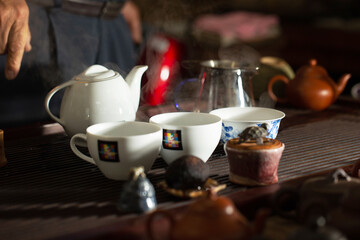 Canvas Print - pouring tea into a teacup	