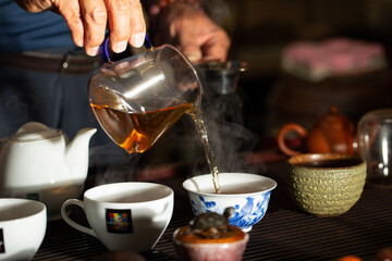 Poster - pouring tea into a teacup