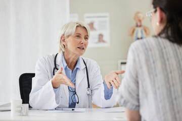 Aufkleber - Senior, doctor and patient for consultation at the clinic about health condition and wellness. Medical, professional and women with communication at hospital in the office about medicine and surgery.