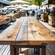 Selective focus, Wood table top on soft focus outdoor market background. For montage product display. generative ai.