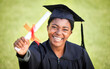 © Beaunitta Van Wyk/peopleimages.com - Portrait, graduation or degree with a student black woman on university campus at a scholarship event. Education, smile or diploma with a happy female pupil standing outdoor as a college graduate
