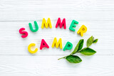 Fototapeta Tęcza - Summer vacation and hike concept. Words Summer Camp made of colorful letters