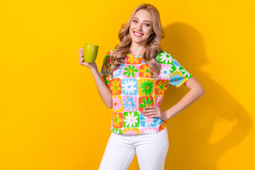 Sticker - Photo of charming business lady hold green tea cup start working day wear trend shirt pants isolated yellow color background