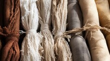 Delve Into The Sustainable Production Of Natural Textiles And Their Role In Promoting A Greener Fashion Industry. From Organic Fibers To Recycled Materials. Generated By AI.