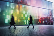 Blurred people in a rush pass in front of a modern building with colorful glass walls.
