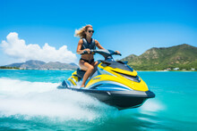 Beautiful Young Woman With Long Hair Having Fun While Driving A Jet Ski On Vacation In Summer. Generative AI