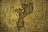 Fototapeta  - map of mozambique on a old vintage crack paper background .