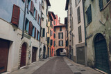 Fototapeta Uliczki - Charming colorful street in Brescia, Lombardy, Italy