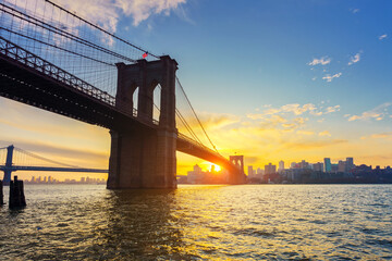 View on Brooklyn bridge and Brooklin at vibrant sunrise, New York City