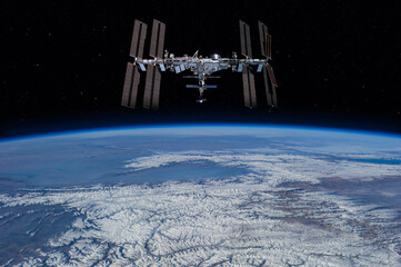 Wall Mural - international space station on orbit of earth. elements of this image furnished by nasa.