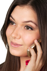 Wall Mural - Close-up portrait of young woman with phone isolated on white background