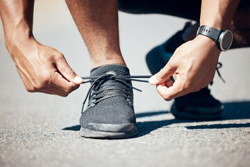 Sticker - Man, hands and tie shoes on road for fitness, running exercise or cardio workout outdoors. Hand of male person, athlete or runner tying shoe getting ready for exercising or training on asphalt street