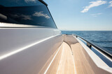 Fototapeta Miasta - yacht prow view on board on the sea