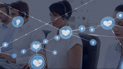 Canvas Print - Animation of connected icons over diverse customer representatives working on computer in office