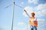 Fototapeta Storczyk - Indian Windmill engineer inspection and progress check wind turbine.