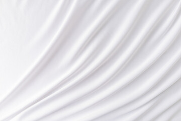 Elegant soft waves of white satin fabric. Abstract wedding background. The concept of the layout of the wedding design.