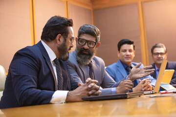 Wall Mural - Businesspeople attending conference meeting in modern office.