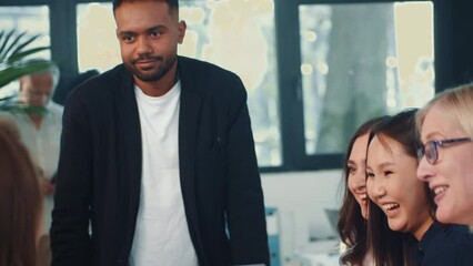 Sticker - Group of multiethnic business colleagues share ideas, brainstorm at office table meeting with young mixed race boss