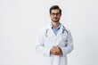 © SHOTPRIME STUDIO - Man doctor in white coat and eyeglasses smile shows hand gestures signs on white isolated background looks into camera, copy space, space for text, health