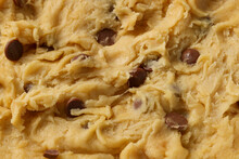 Texture Of Raw Dough As Background, Closeup. Cooking Chocolate Chip Cookies
