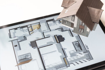 Poster - Small house model is on table and icons home electronics devices connecting with wireless. Smart home controlled and Automation system technology of things