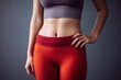 © nadunprabodana - Woman showing her slim waist. Beautiful slim woman body. Generative AI
