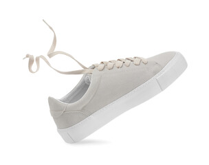 Wall Mural - One stylish beige sneaker isolated on white