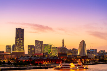 Wall Mural - sweet gold sunset winter and light illumination from Cityscape of Yokohama city, Skyline and office building and downtown in  Minatomirai Area, Yokohama city port, Kanagawa, Japan