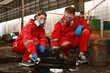 © naraichal - Chemical leak and safety first concept. Group of chemical specialist wear safety uniform, gas mask inspecting chemical leak in industry factory. Two scientists checking quality of liquid in plant