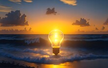 A Light Bulb Sitting On Top Of A Sandy Beach