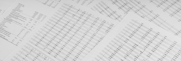 Canvas Print - Financial documents lying on the table. Close-up view.