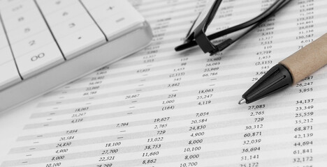 Poster - Calculator on financial statement. Top view.