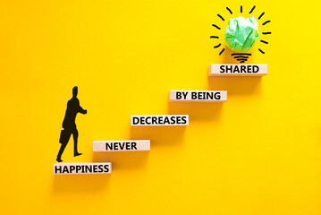 Wall Mural - Happiness symbol. Concept words Happiness never decreases by being shared on wooden block. Beautiful yellow table yellow background. Businessman icon. Motivational Happiness concept. Copy space.