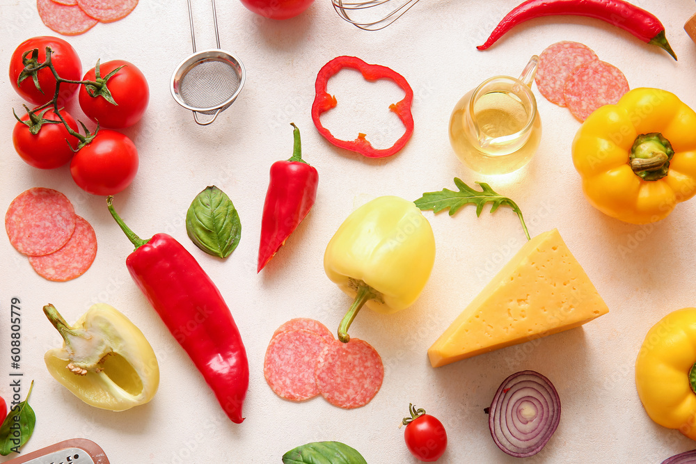Ingredients for preparing pizza on white background