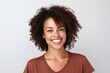 © Robert MEYNER - Close up portrait of beautiful young african american woman smiling and looking at camera.
