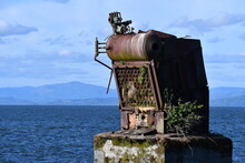 Last Remaining Piece Of A Cannery Sticks Out Of River, Astoria Oregon.