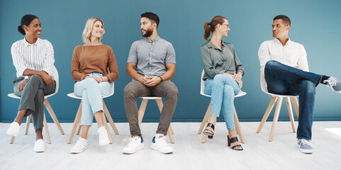 Canvas Print - Interview queue, business people and talk by wall with smile, diversity and waiting room for hr recruitment. Men, women and happy together for interview, human resources and hiring for job at startup