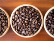 brown arabica coffee bean roast 3 level medium to dark different taste seed caffeine espresso drink food cafe beverage Chiang Rai, Thailand coffee on wooden table background top view selected focus